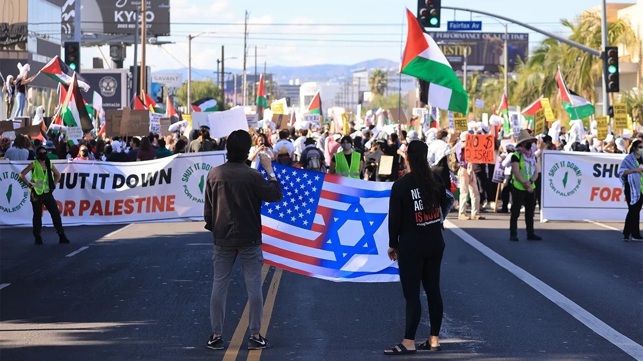 israel american flags la protest