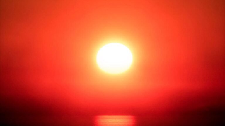 sun over ocean 1152x648