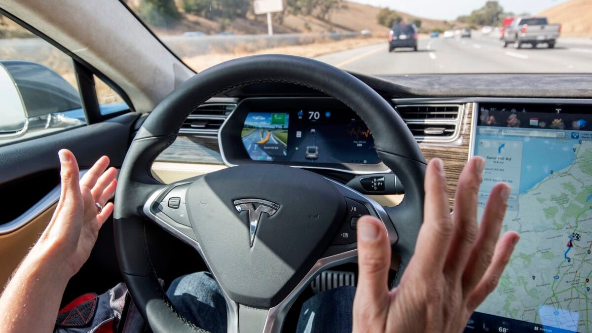 Tesla Cuts Autopilot