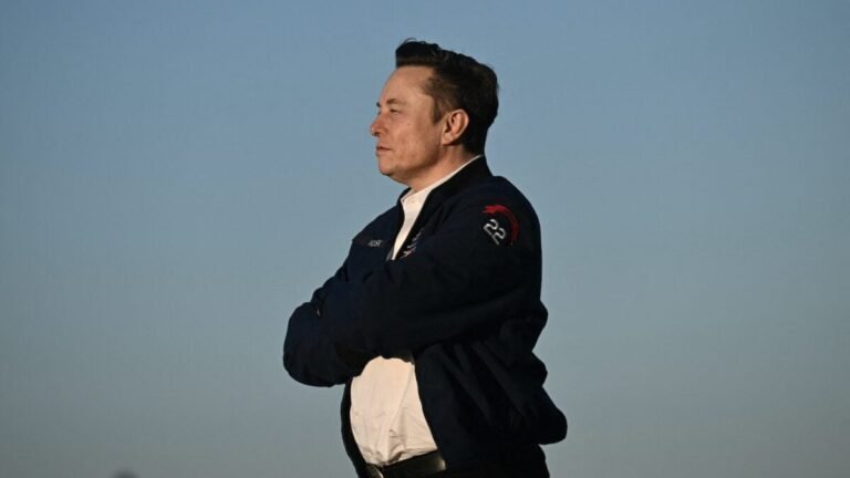 elon folded arms 1200x675