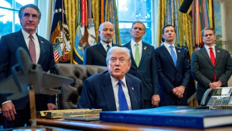 trump seated 1200x675