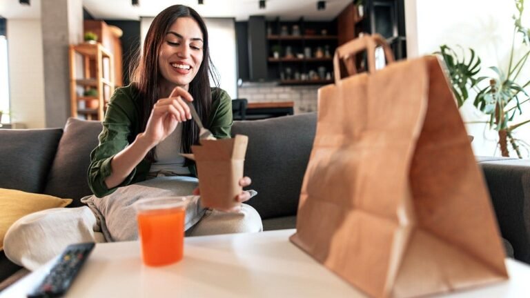 woman eating takeout sofa fox news 001