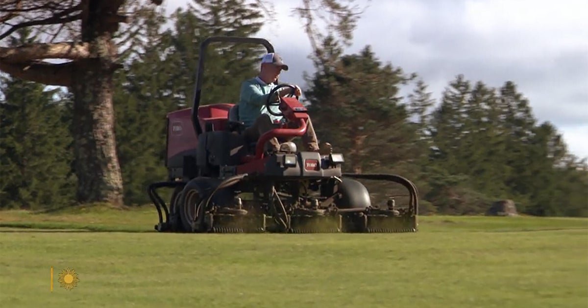 tom coyne mowing fairway 1920